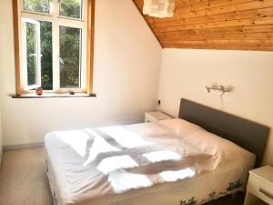 Postel nebo postele na pokoji v ubytování Awesome Foersum