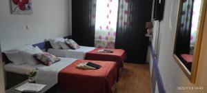 Area soggiorno di Bed and Breakfast M Jasmin