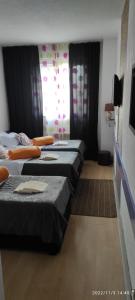 Letto o letti in una camera di Bed and Breakfast M Jasmin