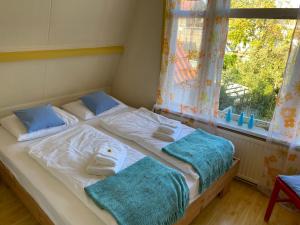 Giường trong phòng chung tại Zierikzee Appartement ZZ 41 B&B