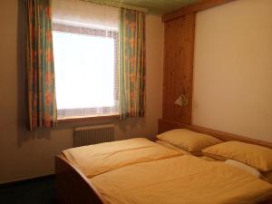 Postel nebo postele na pokoji v ubytování Appartement Aigner