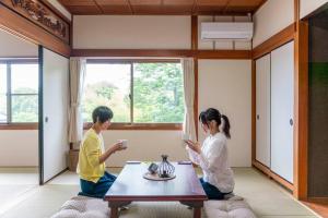 Huéspedes de 自然豊か棚田百選の棚田・道の駅・金剛山登山・釣り・ゴルフに便利/8名宿泊可広々一軒家/無料駐車場