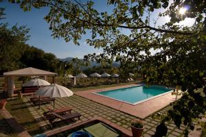 A view of the pool at Complesso Agrituristico La Ciriola or nearby