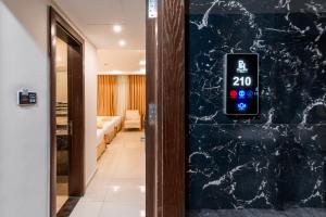 Postel nebo postele na pokoji v ubytování Petra Elite Hotel