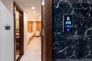 Postel nebo postele na pokoji v ubytování Petra Elite Hotel