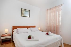 Postel nebo postele na pokoji v ubytování Villa Lilin San