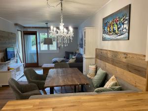 Posezení v ubytování Wohlfühlappartment Gerlitzen + 6 fotografií