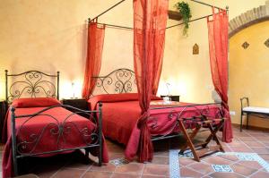 A bed or beds in a room at Il Castello