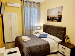 Postel nebo postele na pokoji v ubytování Rose Guest House