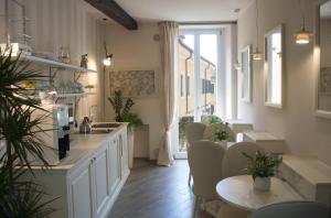 Kuchyň nebo kuchyňský kout v ubytování B&B Verona Centro