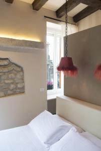 Postel nebo postele na pokoji v ubytování B&B Verona Centro