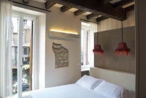 Postel nebo postele na pokoji v ubytování B&B Verona Centro