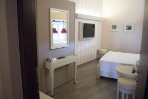 Postel nebo postele na pokoji v ubytování B&B Verona Centro