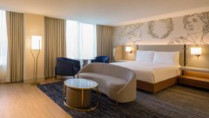 Rúm í herbergi á Caesars Atlantic City Hotel & Casino