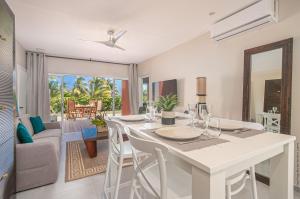 Posezení v ubytování Villa Maorie 1 chambre avec piscine privée + 13 fotografií