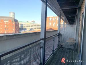 an empty balcony with a view of a city at New Renovated Arcadian Centre - One Bedroom - Balcony - Sofa Bed in Birmingham