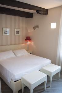 Postel nebo postele na pokoji v ubytování B&B Verona Centro