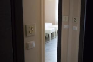 Postel nebo postele na pokoji v ubytování B&B Verona Centro