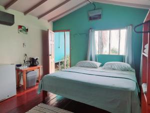 Postel nebo postele na pokoji v ubytování Casa Jade