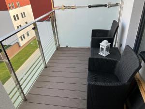 Balkón alebo terasa v ubytovaní Cztery Pory Roku - 4 Seasons Kołobrzeg