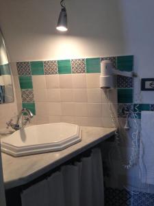 Ванная комната в Giardino Di Sicilia