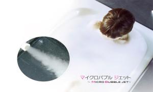 a person sitting on a toilet with a mirror at Hotel New Gaea Hakata Messe Minami in Fukuoka +41 photos