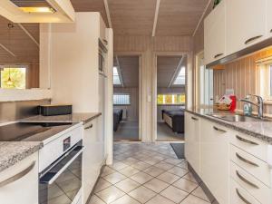 Kuchyň nebo kuchyňský kout v ubytování Luxury Beach House - By Traum Ferienwohnungen