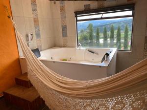 Φωτογραφία από το άλμπουμ του Agradable casa con jacuzzi y sauna agradable vista σε Paipa