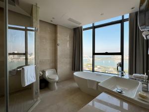 Vannituba majutusasutuses Wyndham Grand Plaza Royale Yuzhou Xiamen Wuyuan Bay