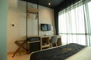 TV a/nebo společenská místnost v ubytování Manhattan Business Hotel TTDI