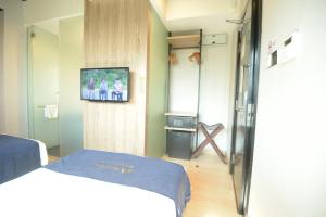 TV a/nebo společenská místnost v ubytování Manhattan Business Hotel TTDI