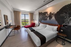 Postel nebo postele na pokoji v ubytování Travelodge Ipoh