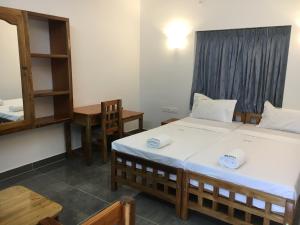 Postel nebo postele na pokoji v ubytování Aloha Homestay