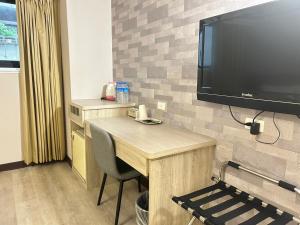 TV a/nebo společenská místnost v ubytování Doitsu Hotel