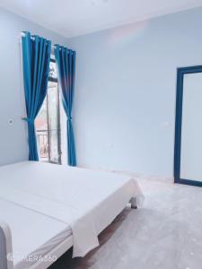 Cama o camas de una habitación en Villa Blueware - Venuestay