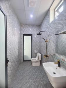 Ένα μπάνιο στο Villa Blueware - Venuestay