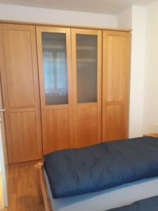 Łóżko lub łóżka w pokoju w obiekcie Ferienappartment in St Oswald - Bad Kleinkirchheim Nähe der Skipiste