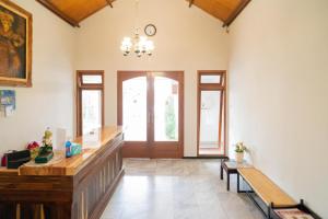 Gambar di galeri bagi Urbanview Hotel Bubusini Batu by RedDoorz di Batu