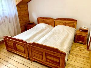 Postel nebo postele na pokoji v ubytování Satori