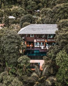 an aerial view of a house in the jungle at Villa Lydia, Koh Yao Noi in Ko Yao Noi