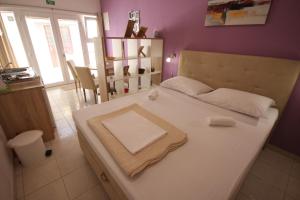 Posteľ alebo postele v izbe v ubytovaní Apartment Antonio