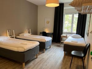 Postel nebo postele na pokoji v ubytování Sidsjö Hotell & Konferens + 37 fotografií