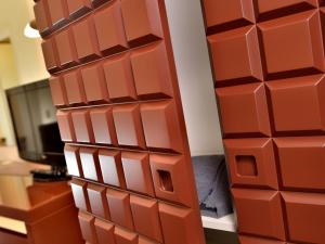 a wall made out of lego bricks at Chocohotel in Perugia