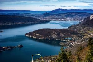 a view of a large body of water with a city at Joli T2 industrie hyper centre Annecy in Annecy