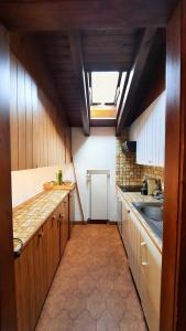 Kuchyň nebo kuchyňský kout v ubytování Charmant appartement au coeur de Vercorin