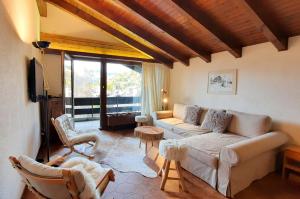 Posezení v ubytování Charmant appartement au coeur de Vercorin