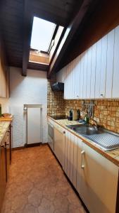 Kuchyň nebo kuchyňský kout v ubytování Charmant appartement au coeur de Vercorin