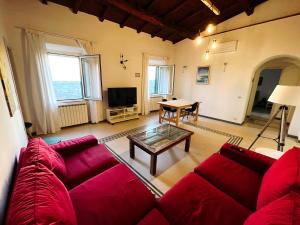 Televízia a/alebo spoločenská miestnosť v ubytovaní Ulisse's LOFT - Incantevole vista mare, centro storico e spiaggia a piedi - wifi