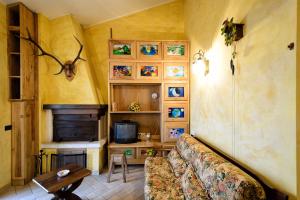 Televízia a/alebo spoločenská miestnosť v ubytovaní Casa Panoramica