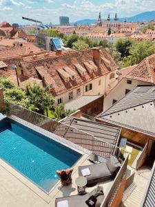 Bazén v ubytovaní Kai 36 - Hotel zwischen Fels und Fluss alebo v jeho blízkosti